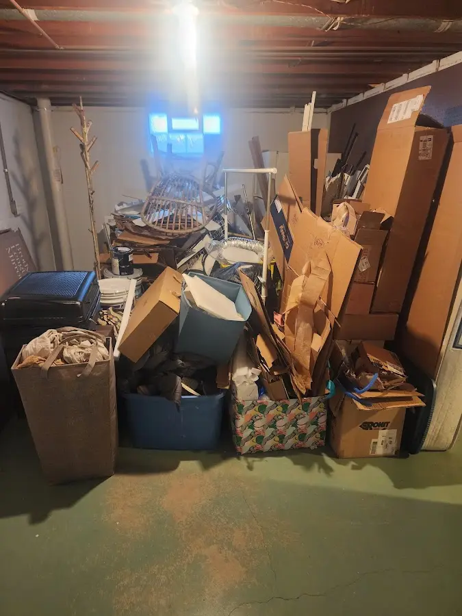 Roll-off dumpster container at job site for 2 Yard Dumpster Rental in Wahiawa